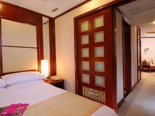 Brightel All Suites Xangai Quarto foto
