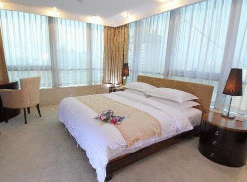 Brightel All Suites Xangai Quarto foto