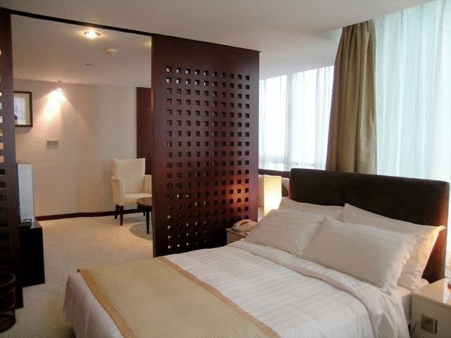 Brightel All Suites Xangai Quarto foto