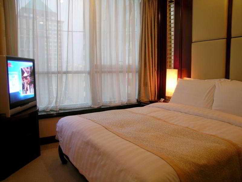 Brightel All Suites Xangai Quarto foto